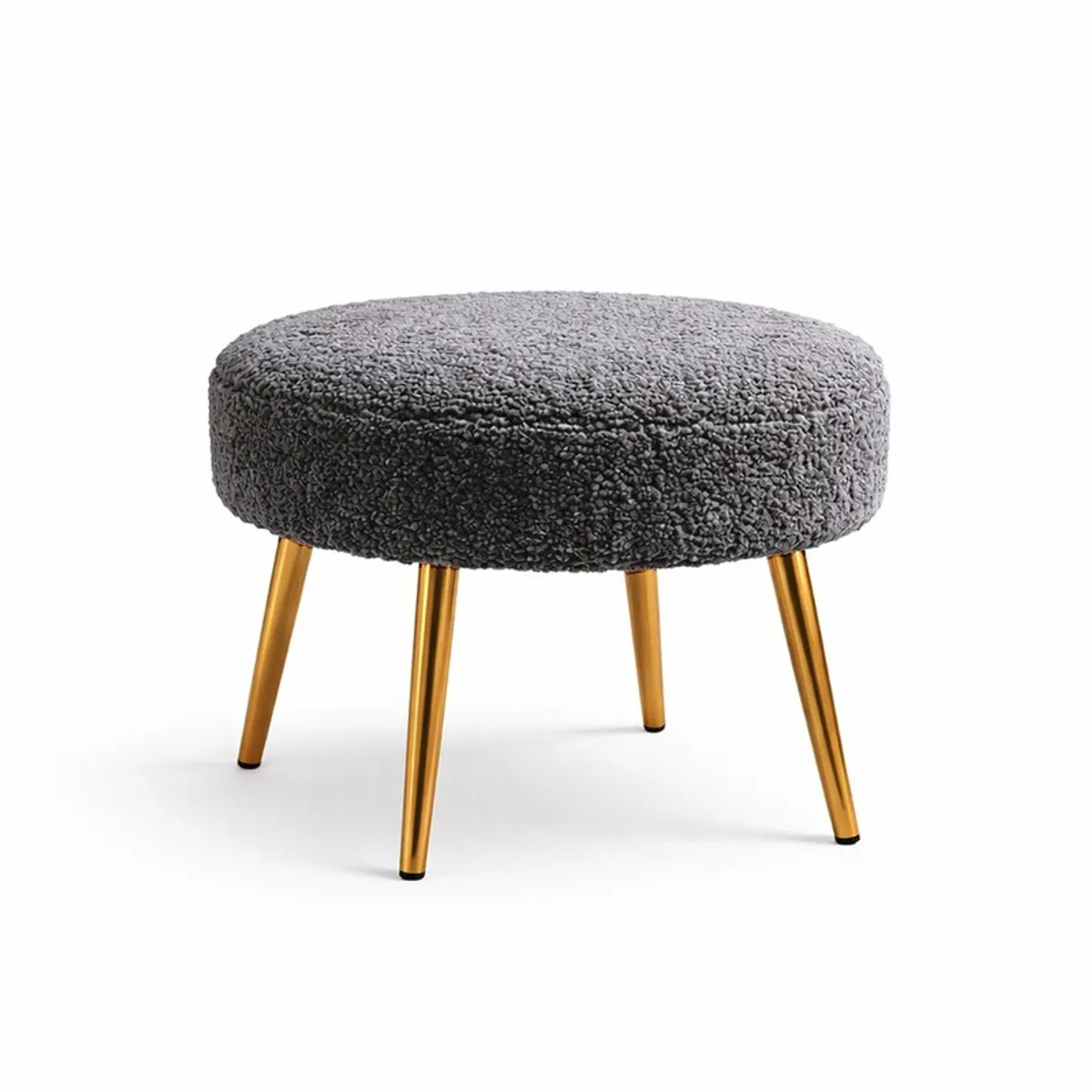 Dark grey round upholstered stool with four gold-finished legs on a white background