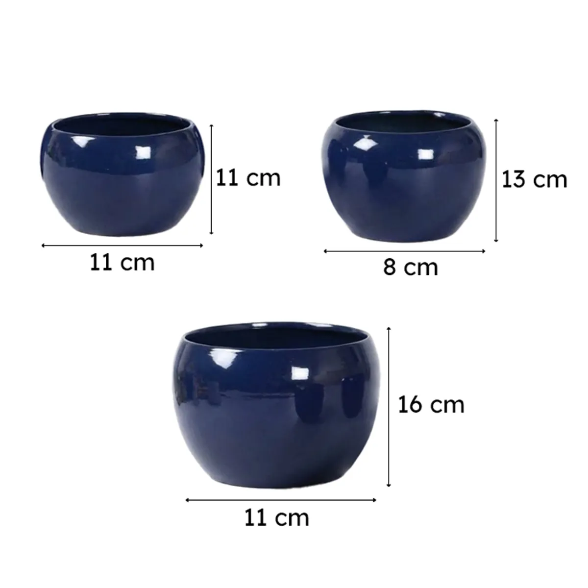 Three glossy blue planters arranged together against a neutral background.