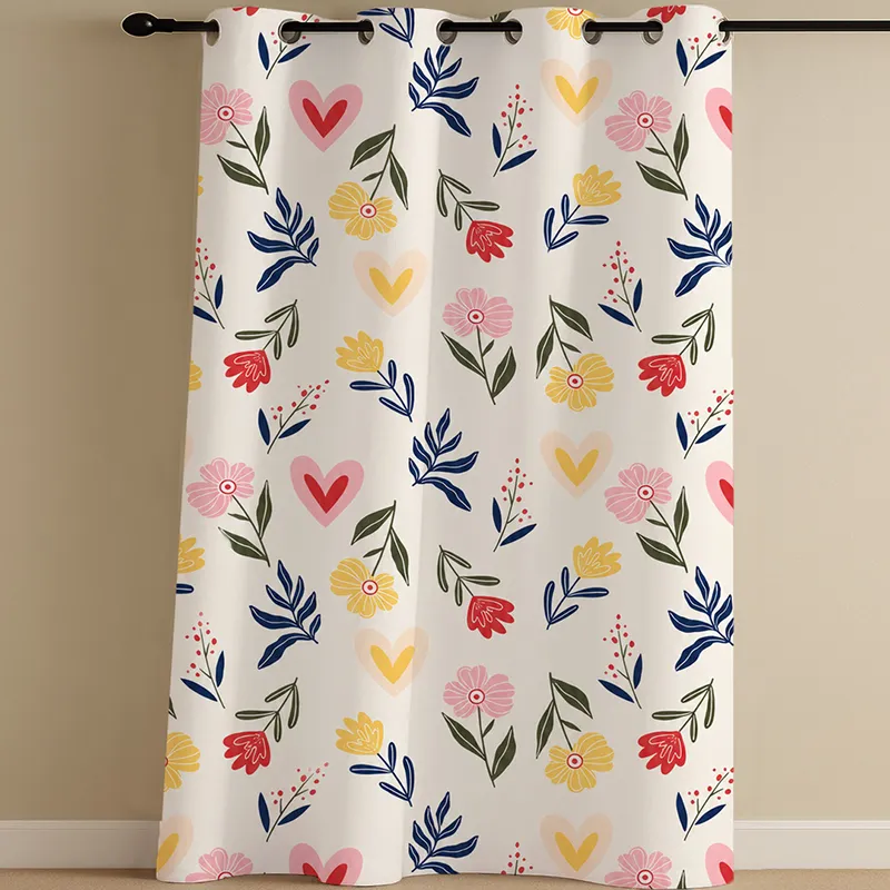 Full-length multicolour floral and heart print curtain on a rod.