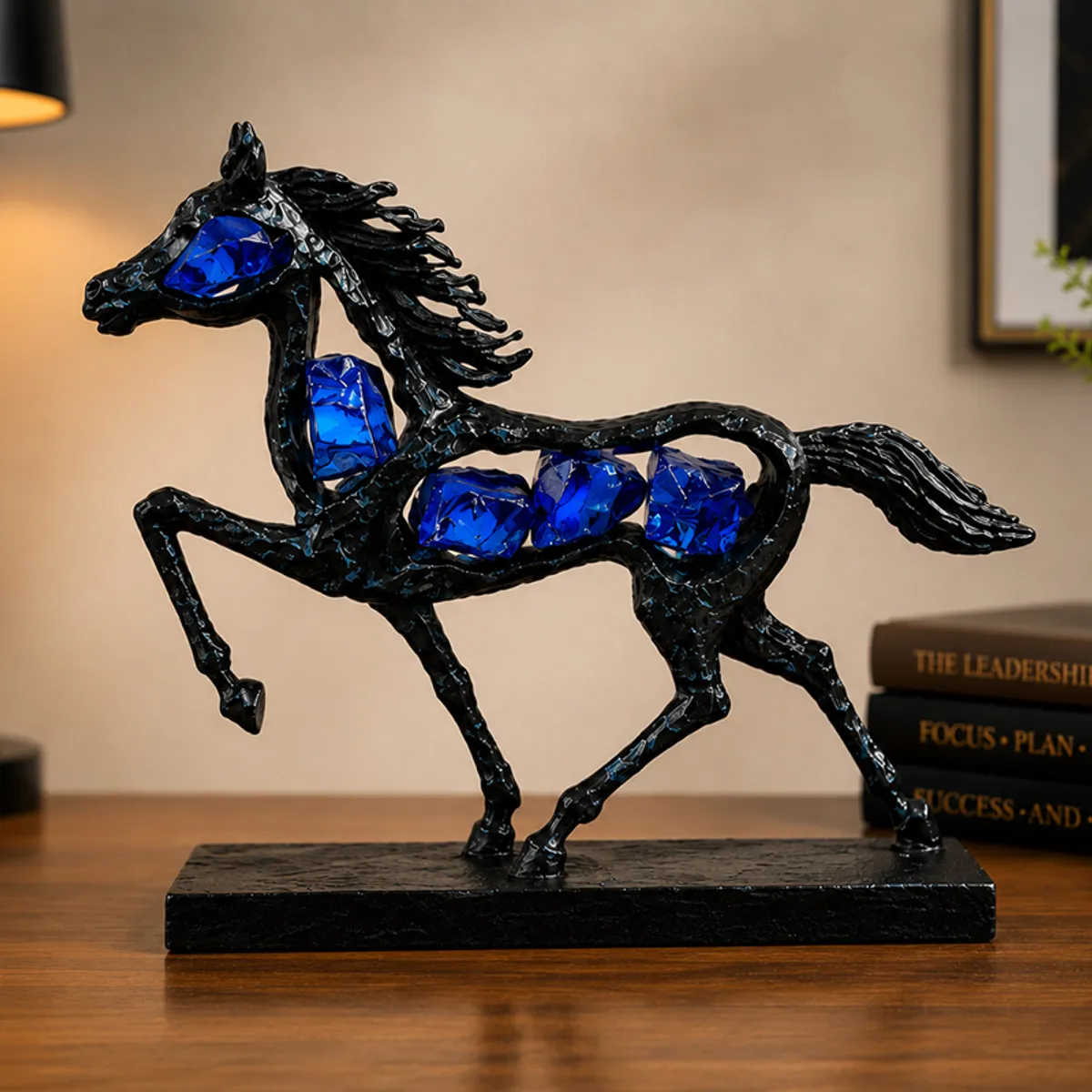 Close view of black horse figurine with vivid blue crystal-style accents