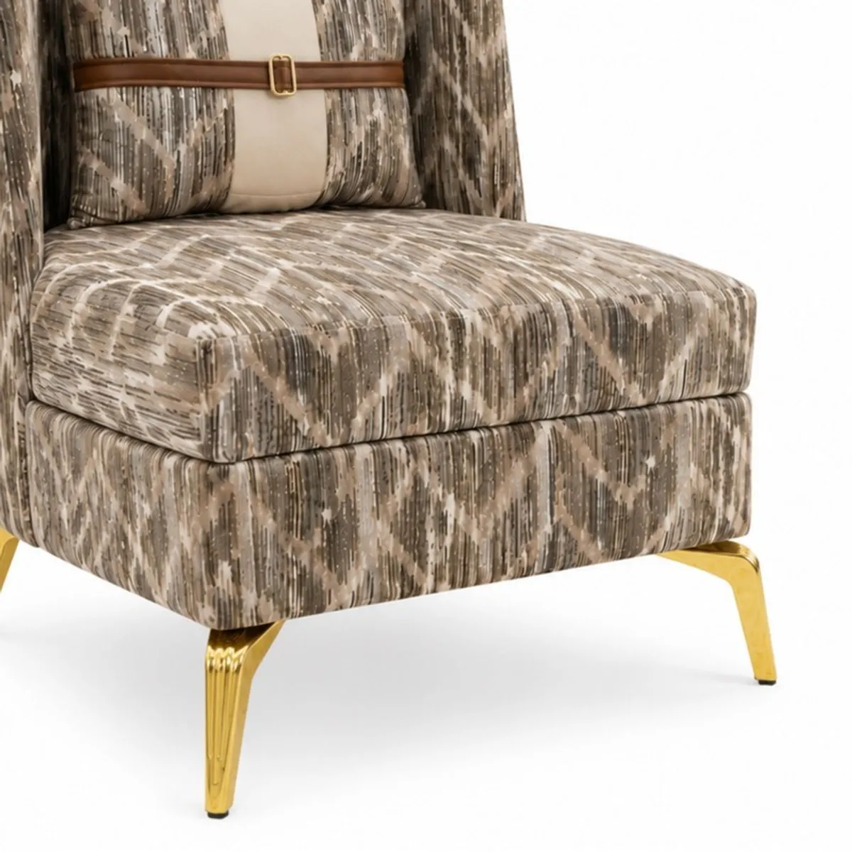 Close-up of the patterned seat, upholstery and gold-toned chair leg