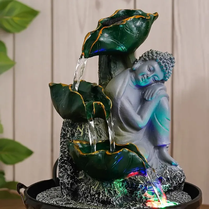 Close view of Buddha tabletop fountain with layered leaf bowls