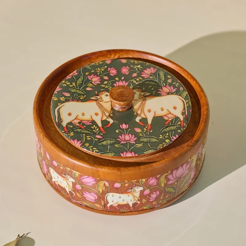 Closed brown wooden masala box with colourful lotus and cow artwork