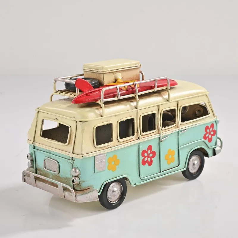Rear angled view of blue and ivory caravan showpiece with floral accents