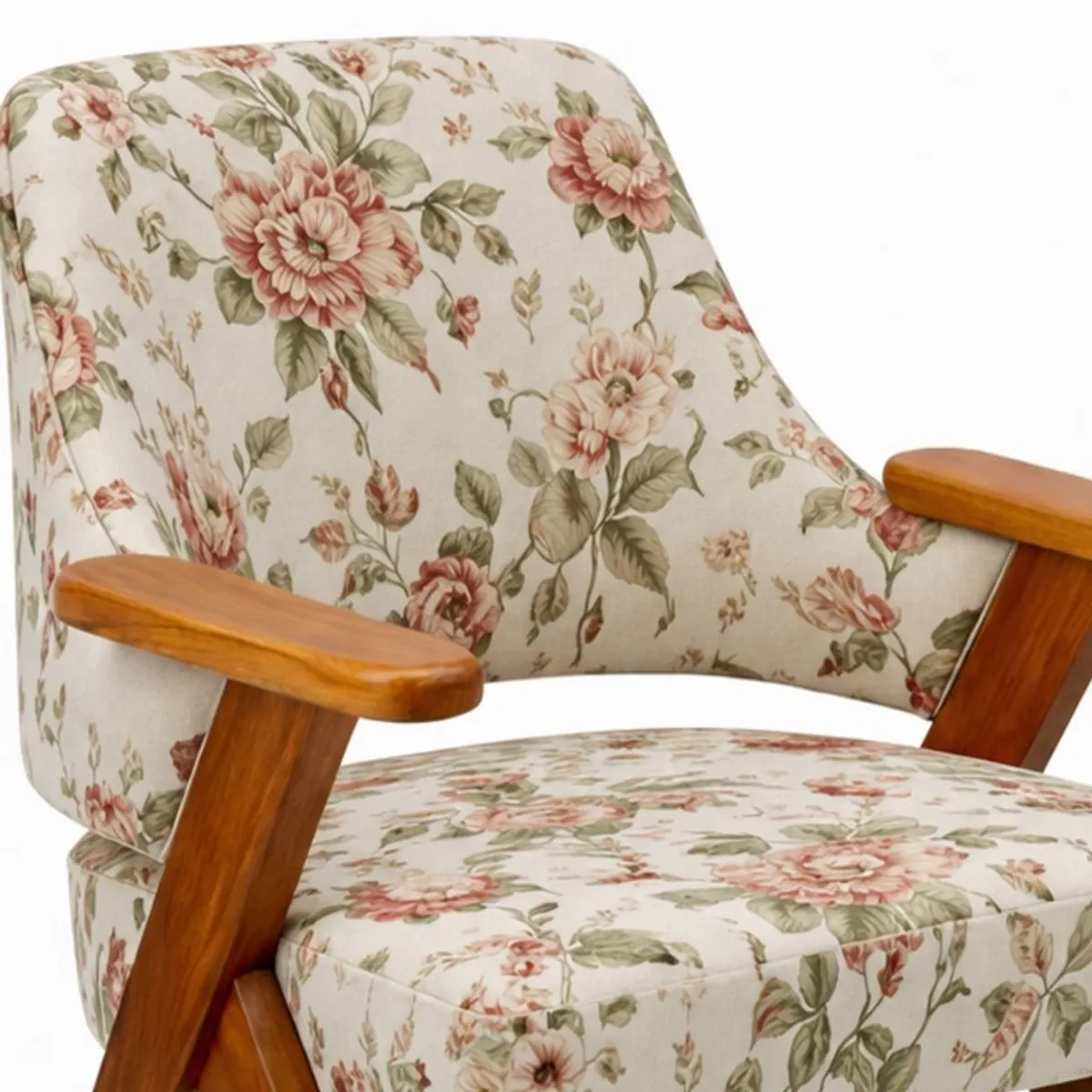 Close-up of floral velvet backrest and wooden armrest on the accent chair