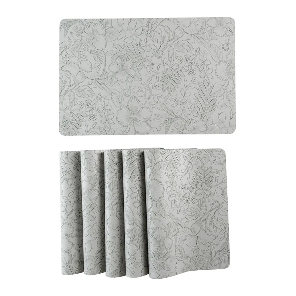 Single grey floral table mat with stacked mats below
