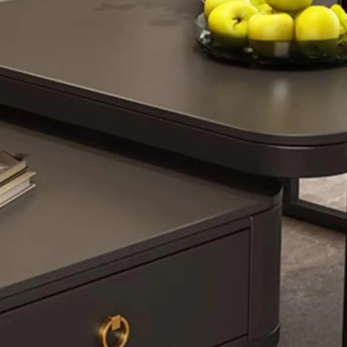 Close-up of the table edge and drawer front with round metal pull