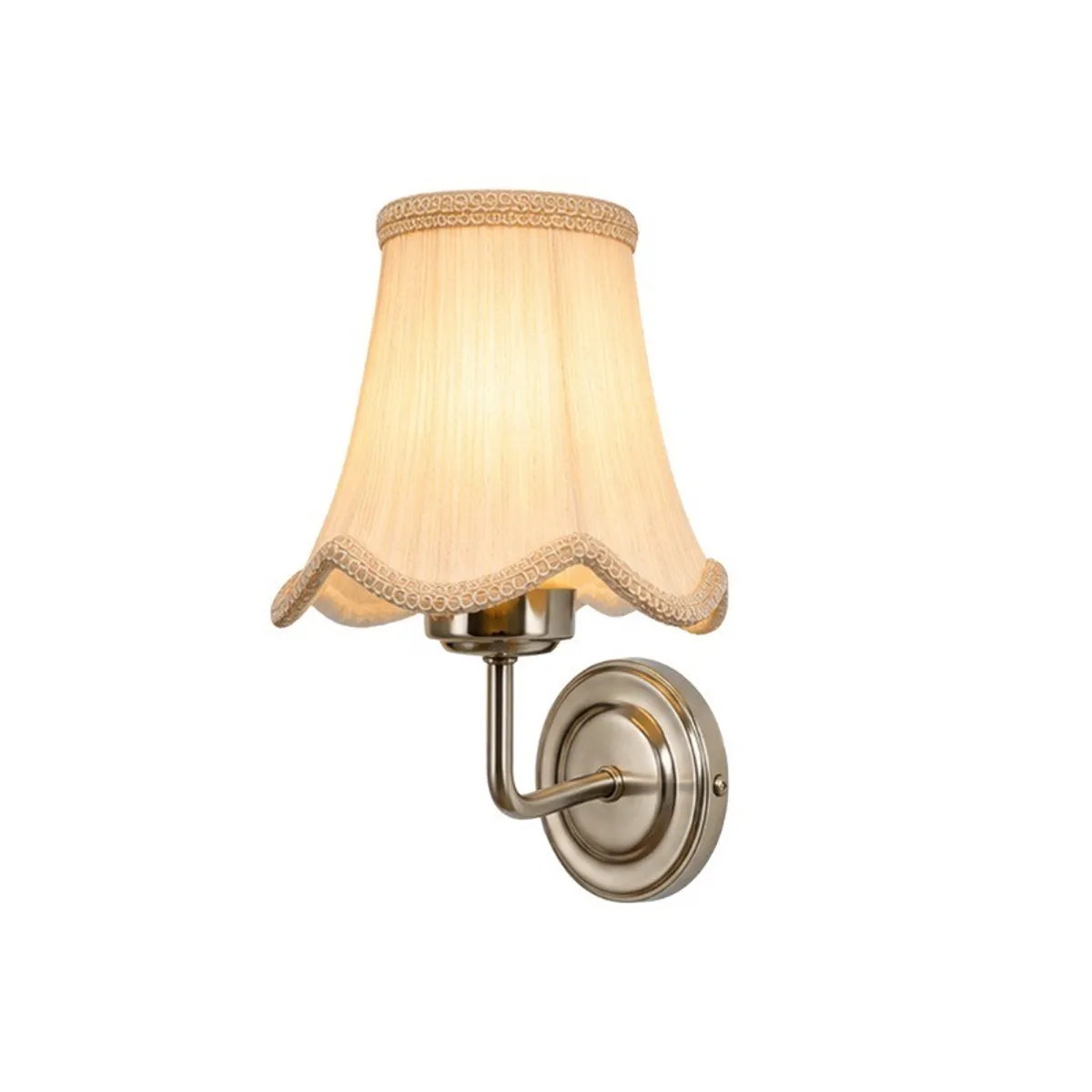 White cotton wall lamp glowing warmly against a white background