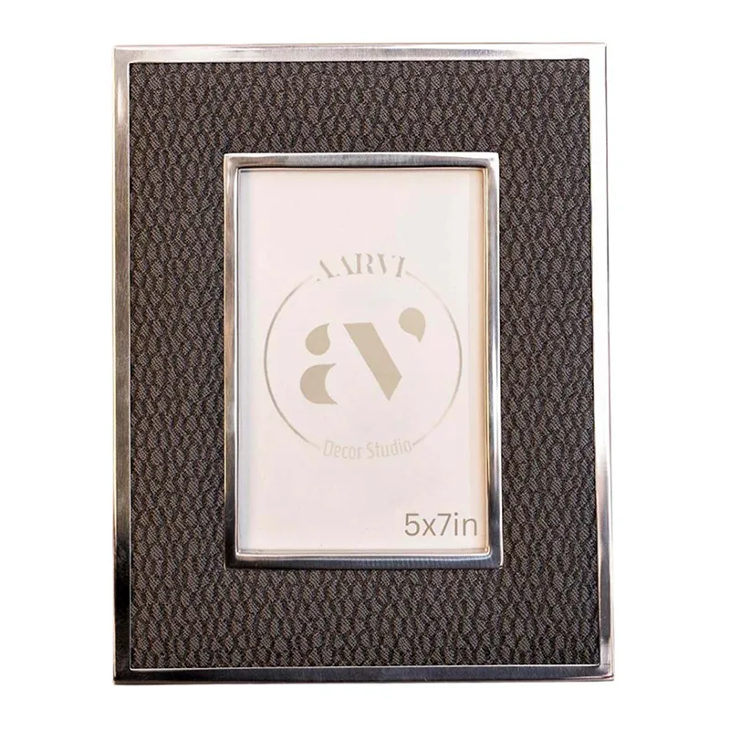 Front view of black rectangular photo frame with textured surface and metallic border