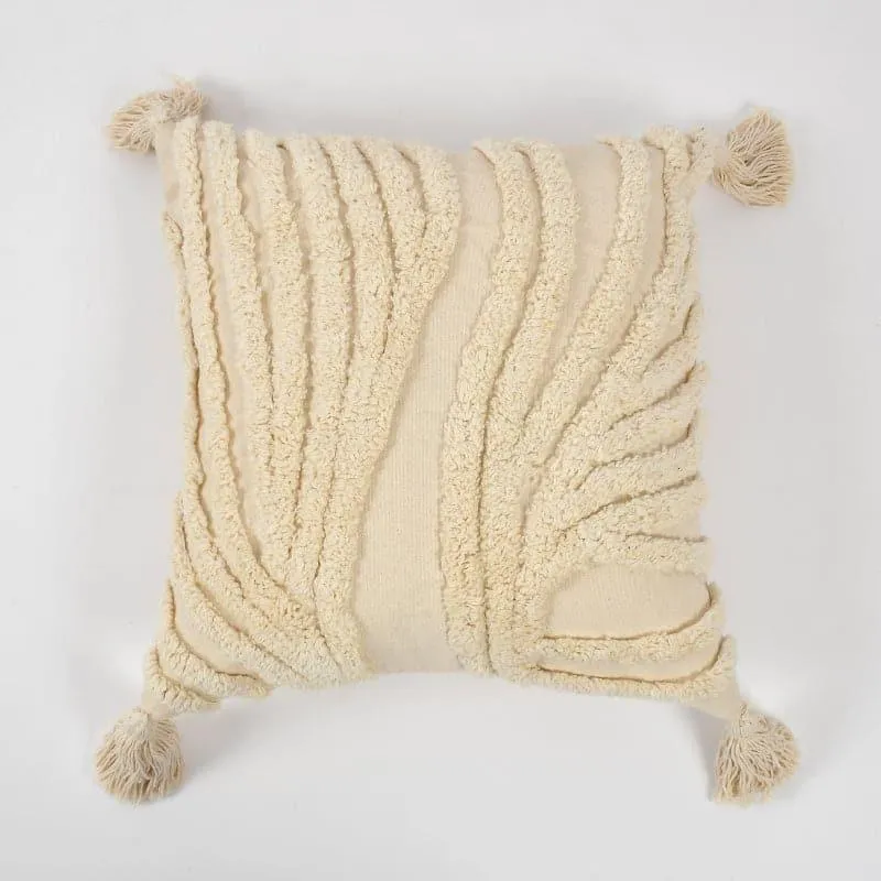 Front view of a white square tufted cushion cover with four tassels