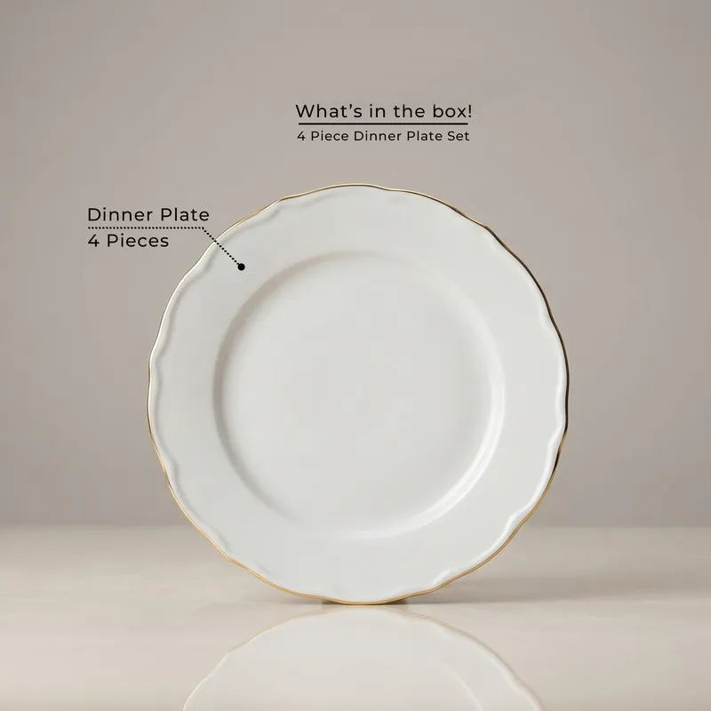 Single white round dinner plate with scalloped edge and gold rim