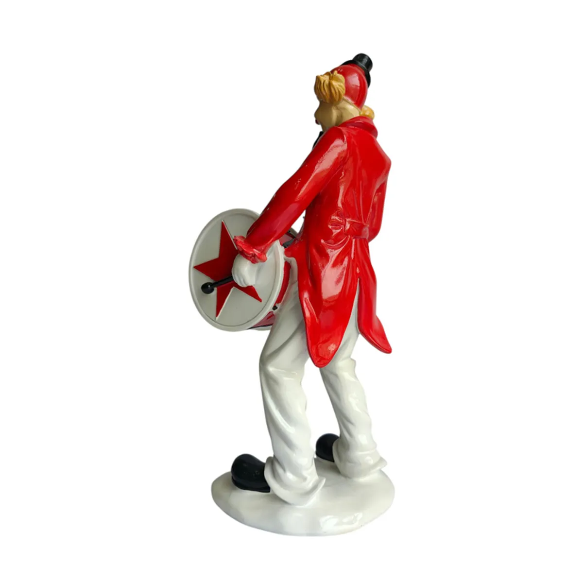 Side-rear view of clown showpiece with drum and sculpted base