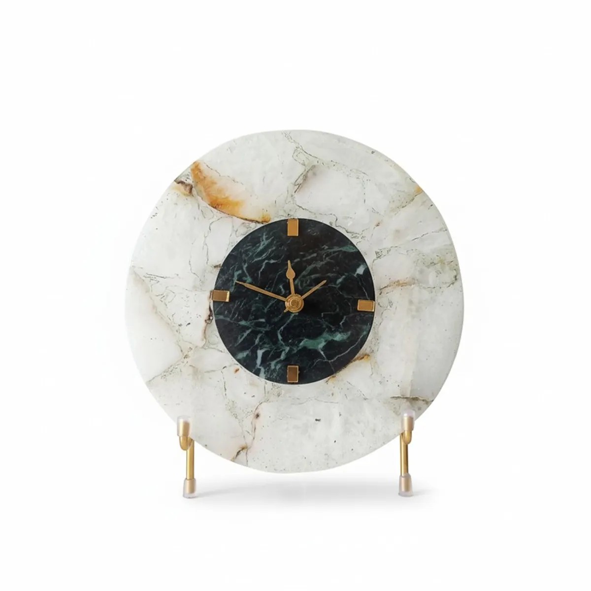 Front view of round white agate table clock with black centre and gold stand