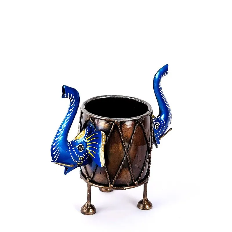Angled view of brown metal pen stand with blue elephant details