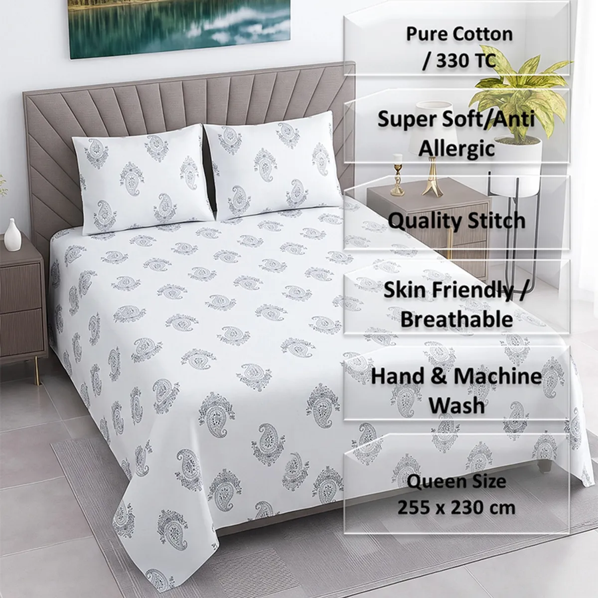 White bedsheet with black botanical motifs styled on a bed with matching pillow covers