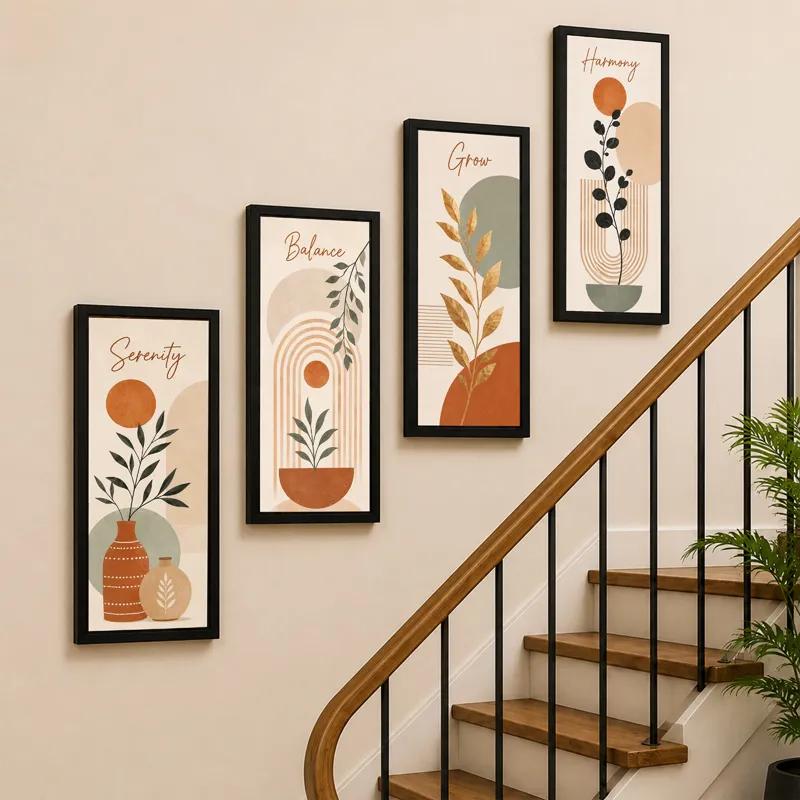Four tall framed abstract botanical prints displayed along a staircase wall.