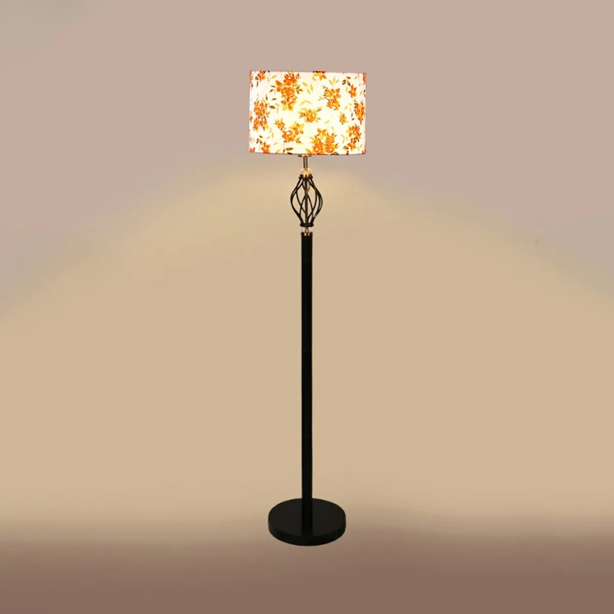 Floral floor lamp lit against a plain beige background