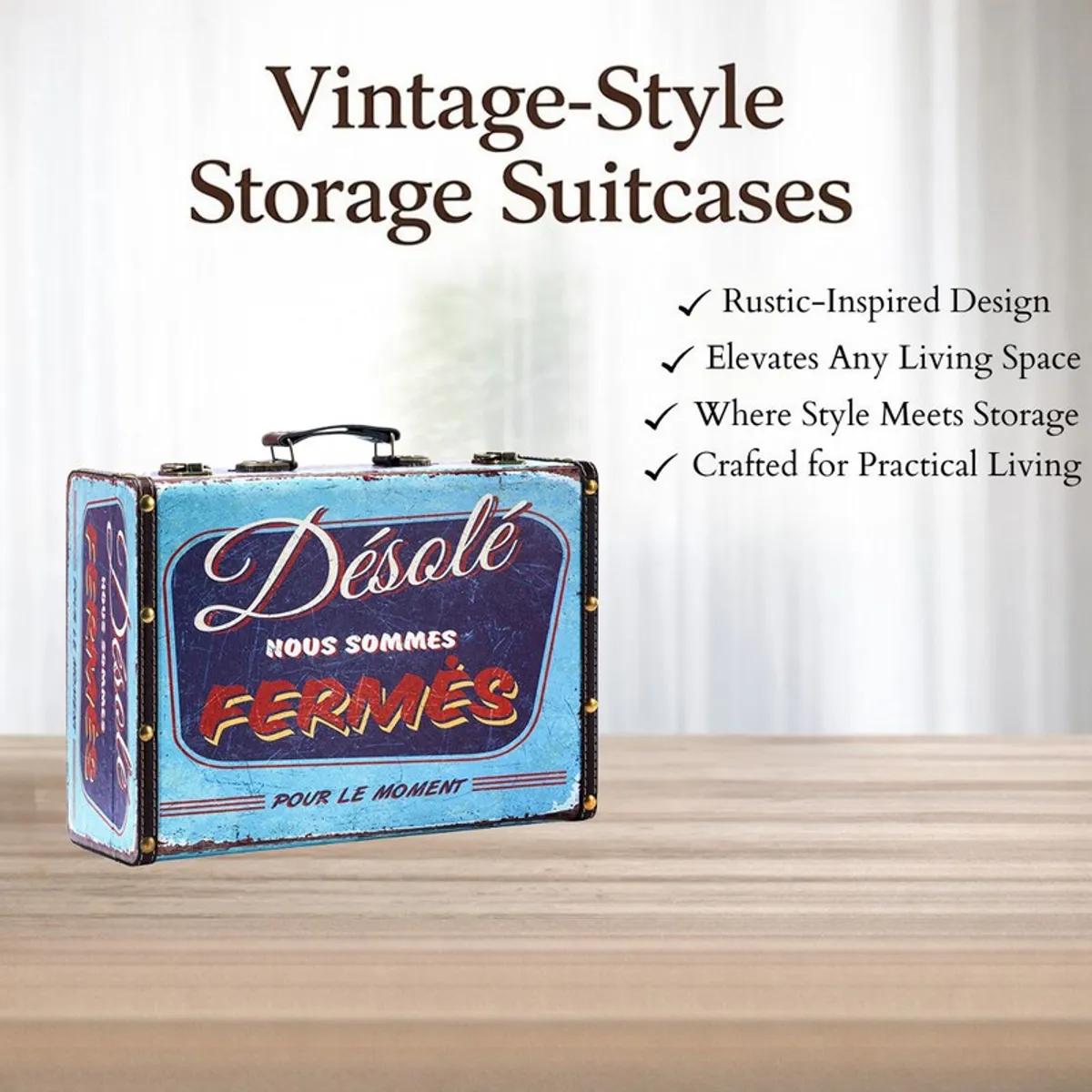 Blue vintage-style suitcase storage box with distressed print on a tabletop