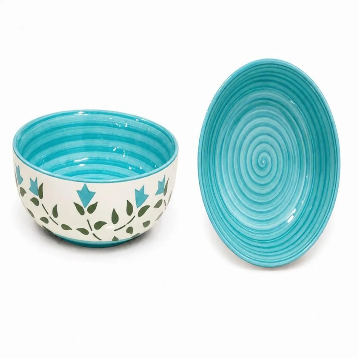 Blue and white floral ceramic snack bowl shown beside its turquoise patterned underside