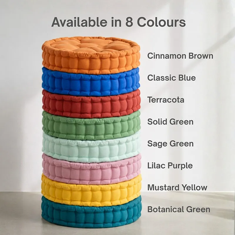 Stack of floor cushions in multiple colours including mustard yellow