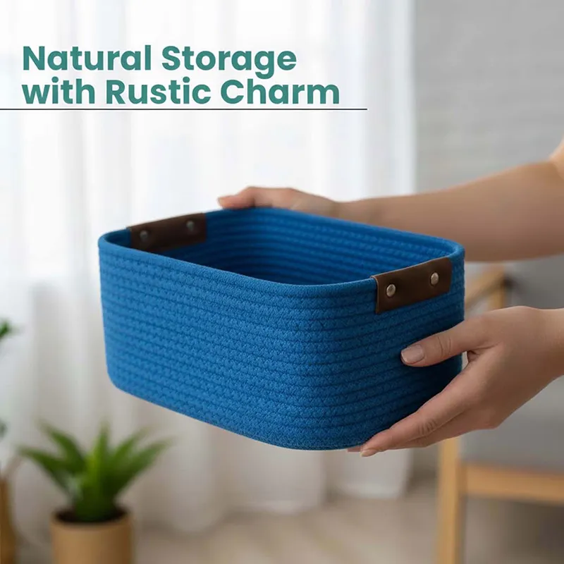 Hands holding a blue rectangular woven storage basket with brown side handles