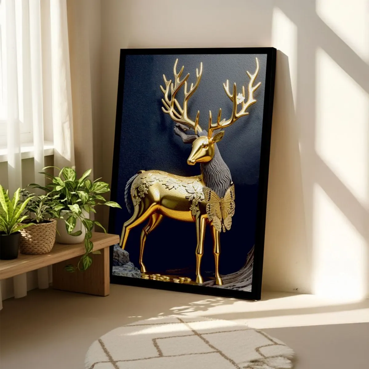 Framed golden stag artwork placed on the floor near indoor plants