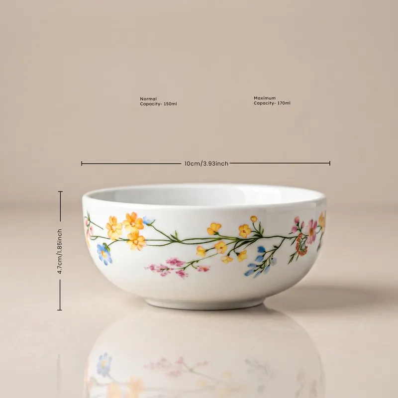 Round white bowl with multicolour floral vine pattern on the outside