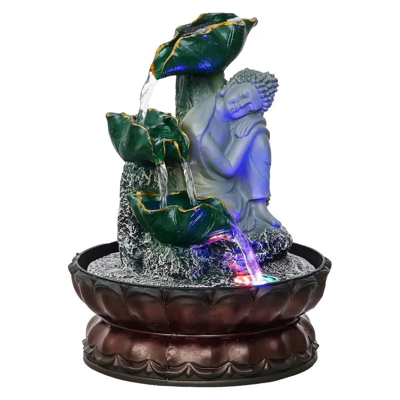 Front angled view of Buddha fountain with illuminated water stream