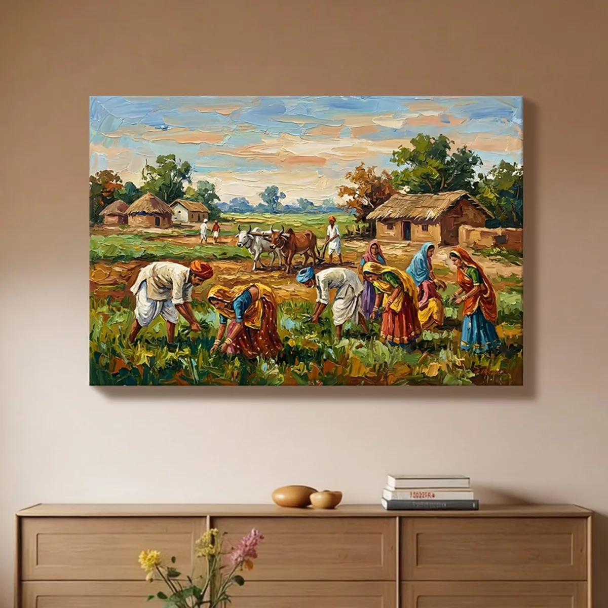 Rural village harvest painting in rich colours hung above a wooden sideboard