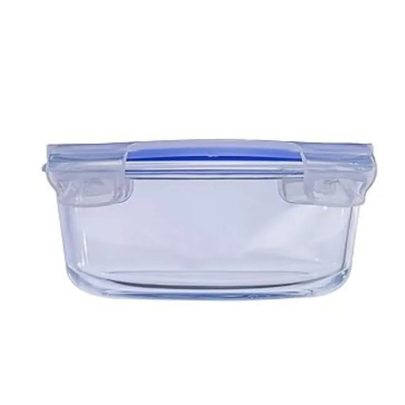 Side view of a round transparent glass container with blue locking lid