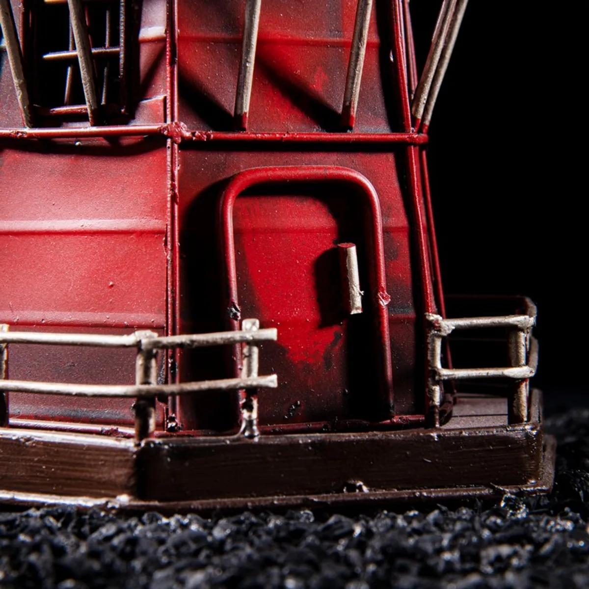 Close-up of the red windmill showpiece base and door detail