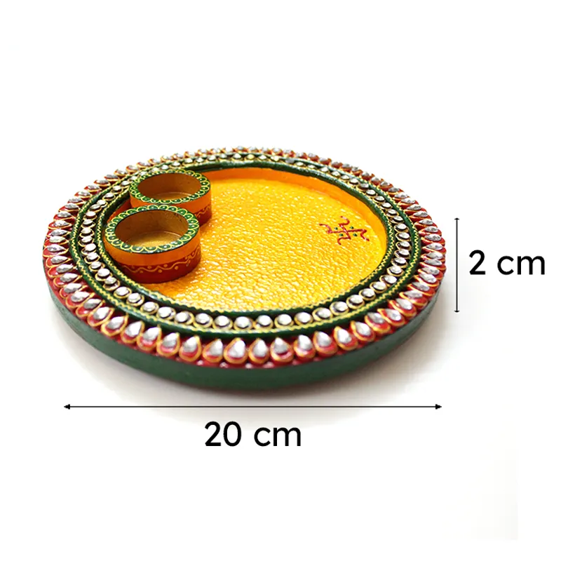 Yellow round pooja thali with two bowls shown with size markers