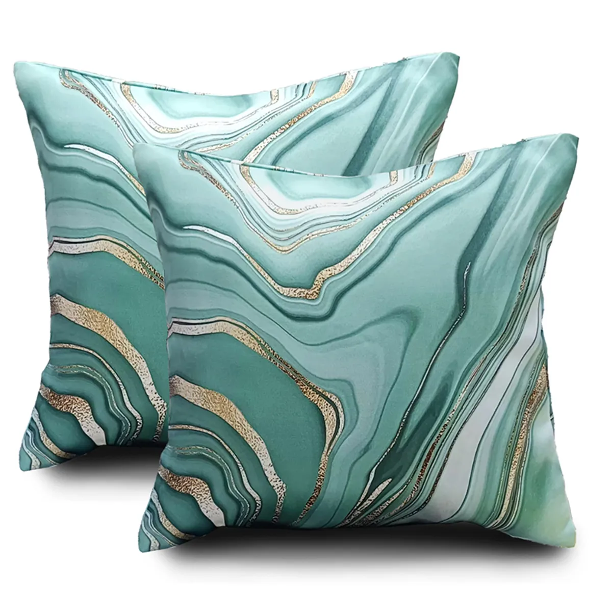 Two square green, white and gold marbled cushion covers on white background