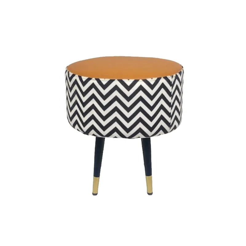 Front view of a round ottoman with brown top, chevron sides and black legs