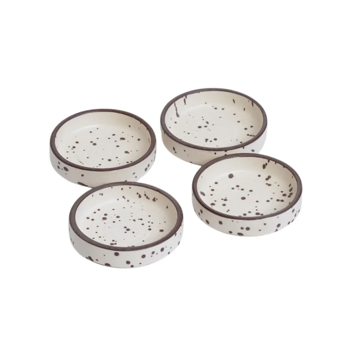 Set of four speckled white ceramic dip bowls on a white background
