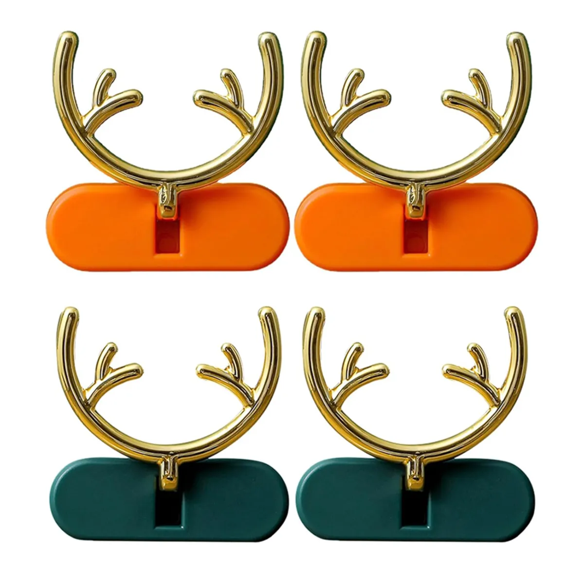 Four antler-shaped wall hooks with orange and green bases on white background