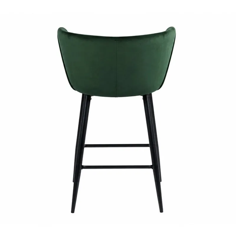 Back view of green velvet bar chair with black metal legs