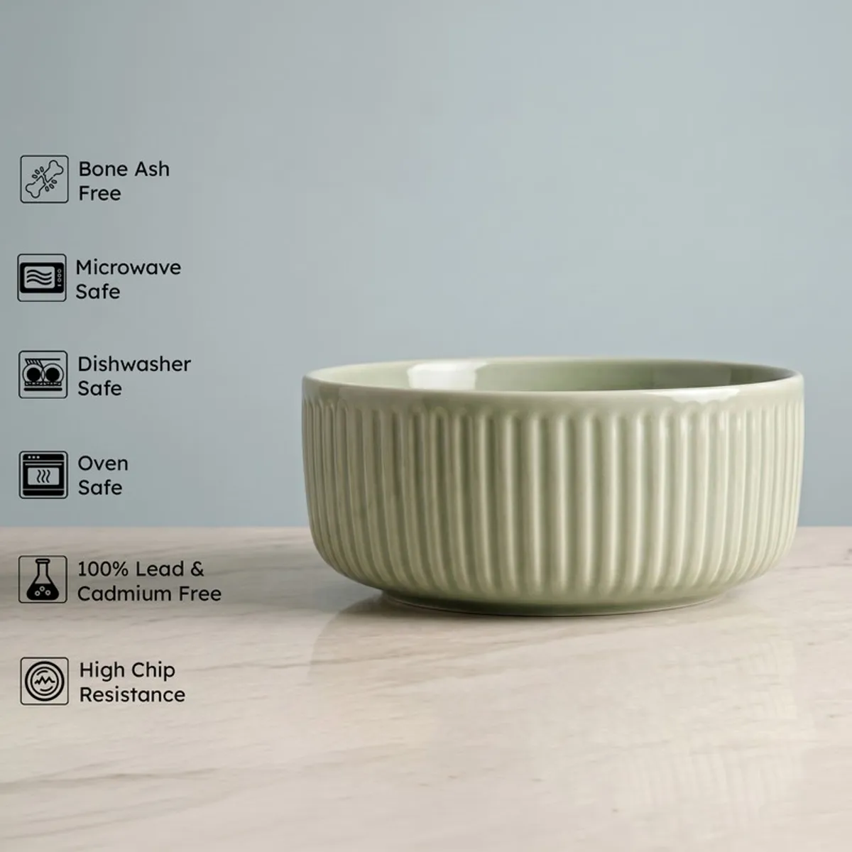 Sage green ribbed serving bowl shown from the side