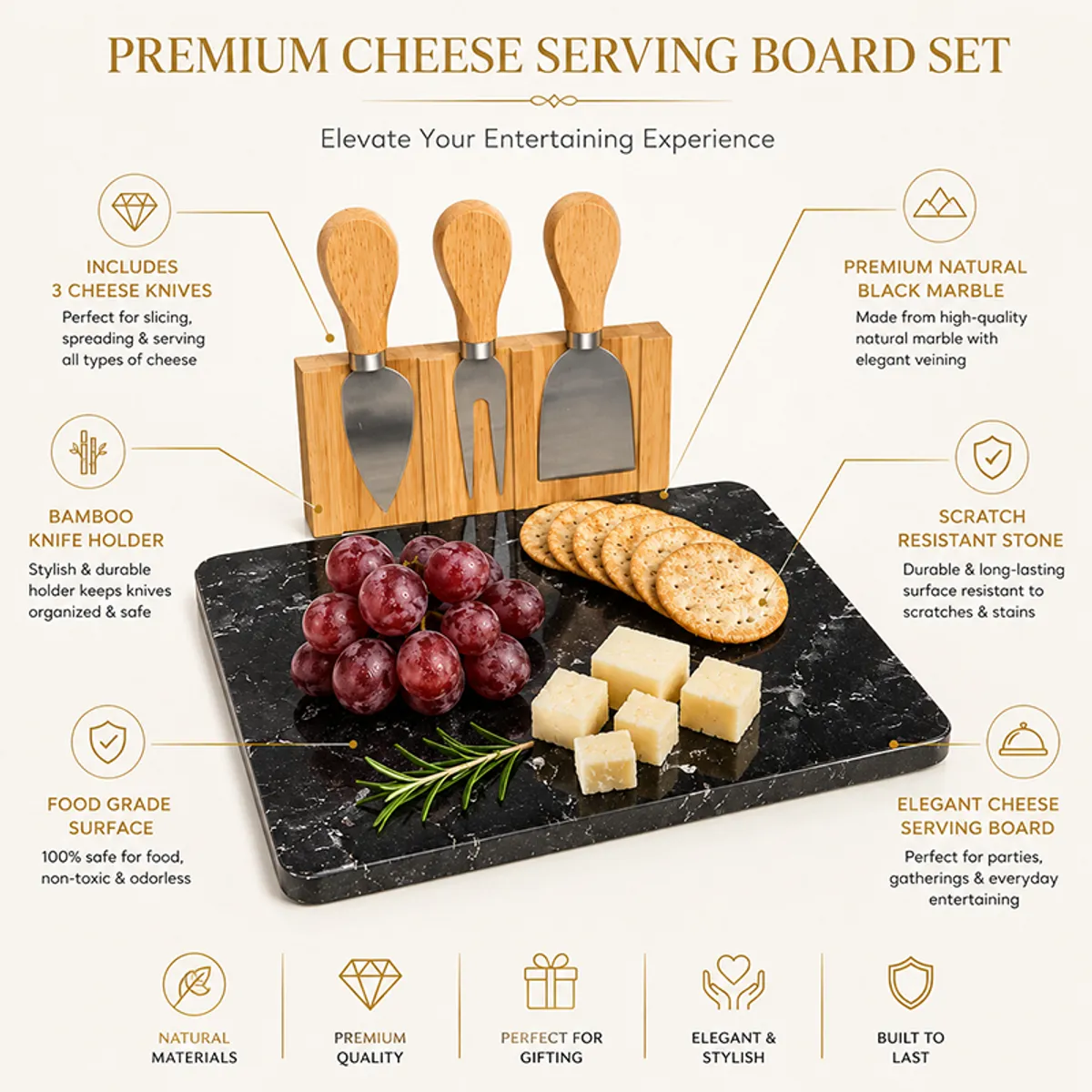 Black cheese serving board with three wooden-handled tools and appetisers on a table