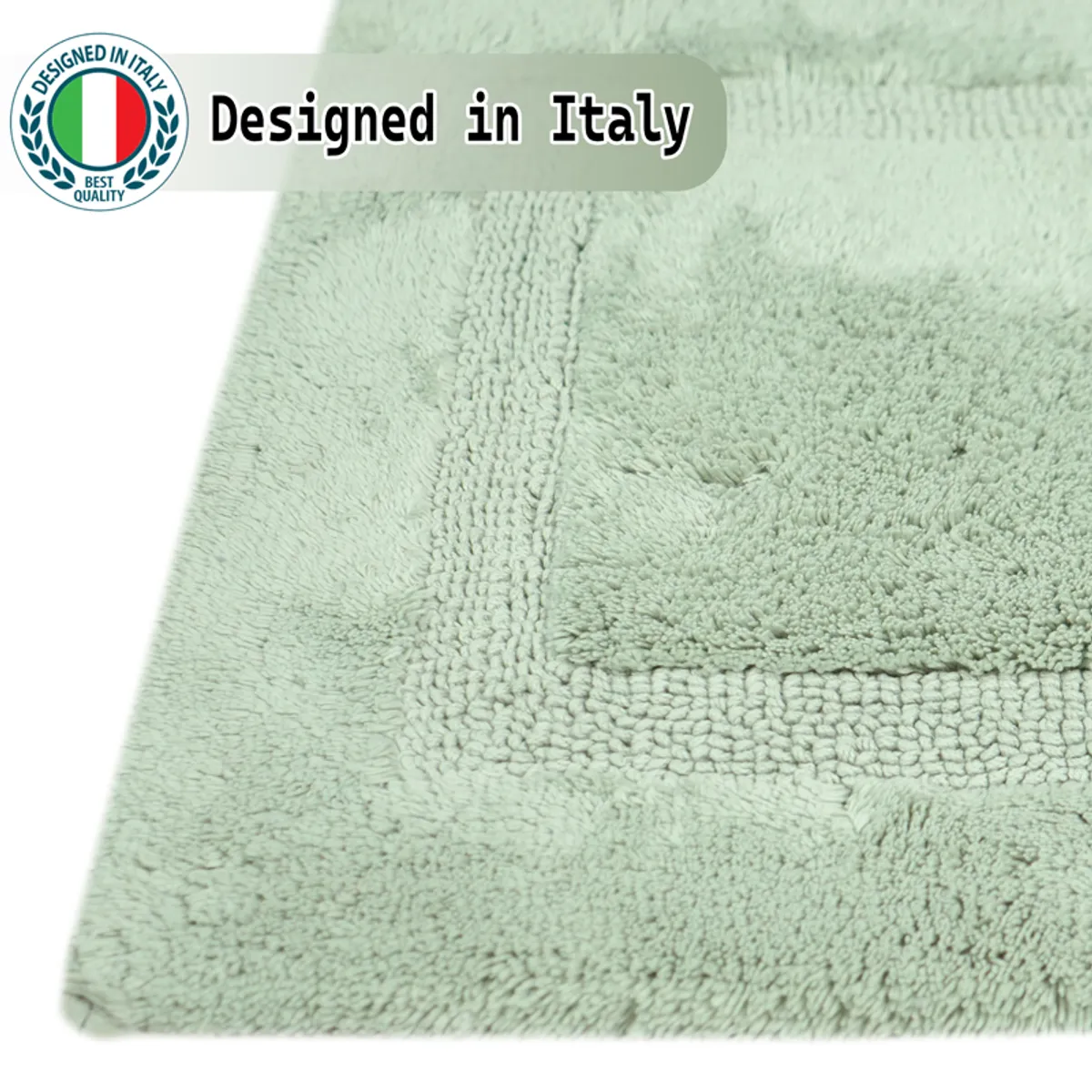 Close-up view of the green bath mat's geometric surface design