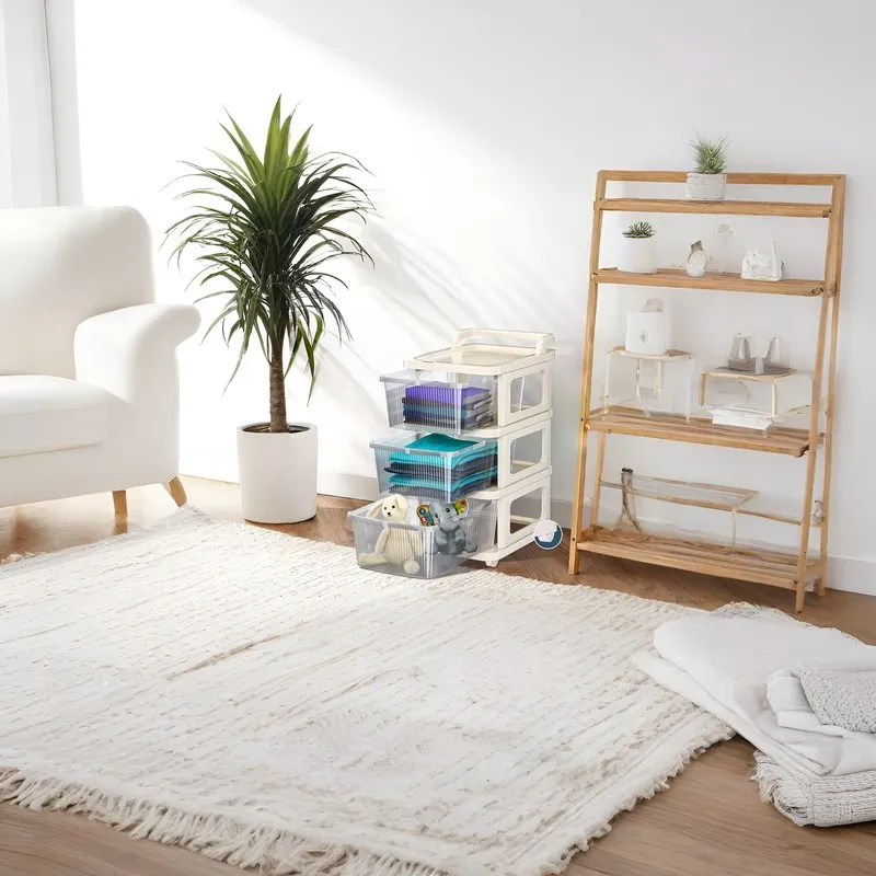 White utility rack with open drawers used for organising items in a living room