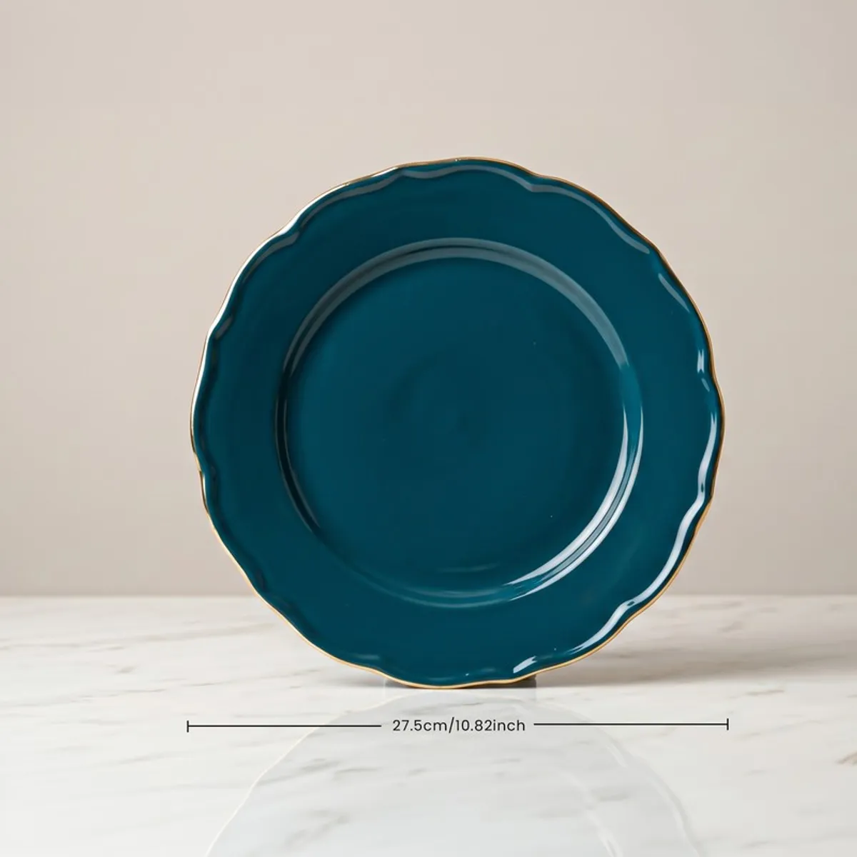 Single dark teal scalloped dinner plate with gold edging