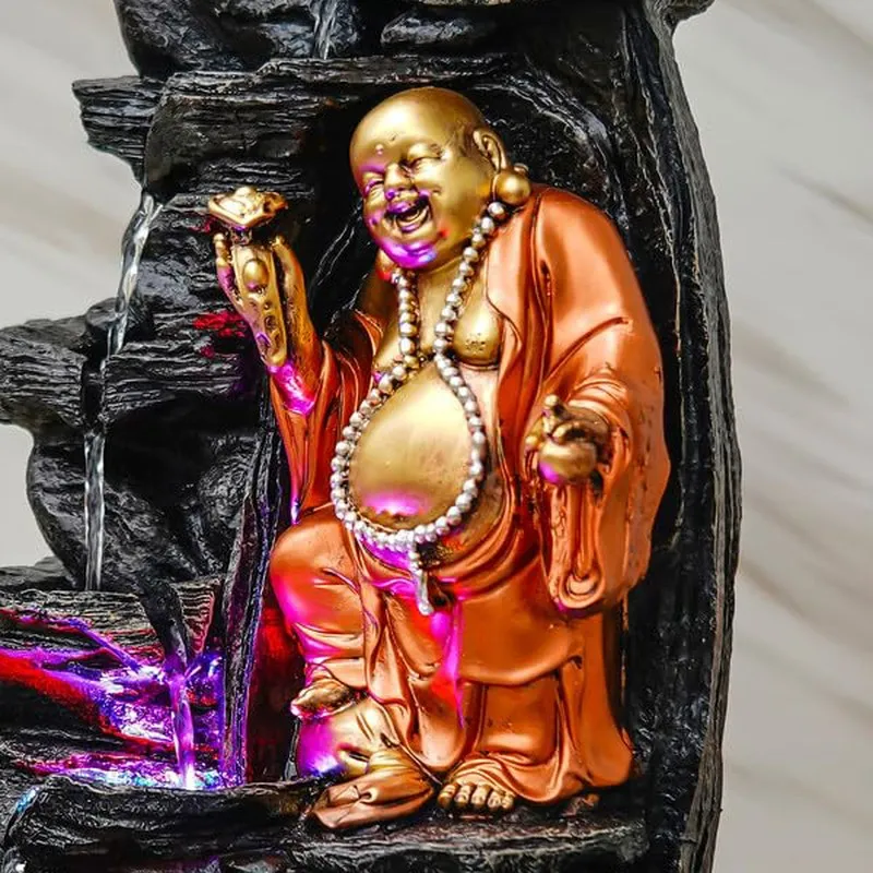 Close-up of gold and orange Laughing Buddha figure
