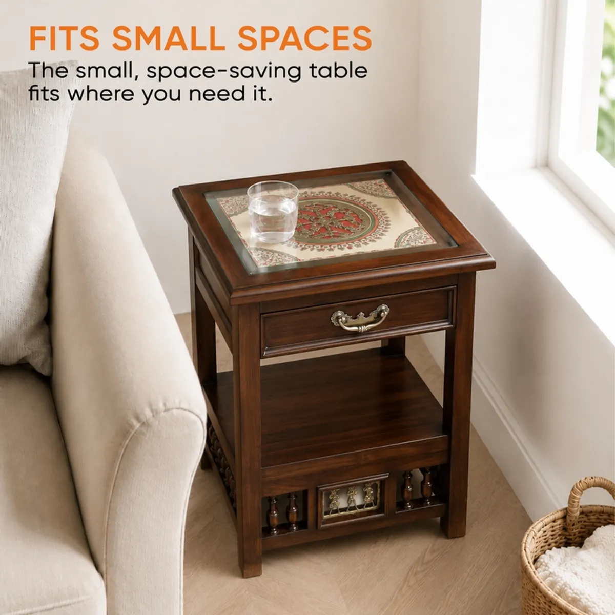 Compact brown side table with square top, drawer and lower shelf placed beside a sofa