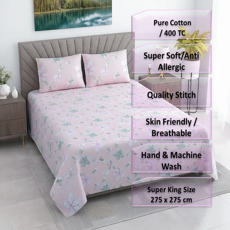 Pink floral bedsheet with matching pillow covers styled on a bed