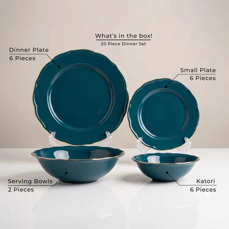 Dinner set pieces displayed individually in dark teal with gold rims