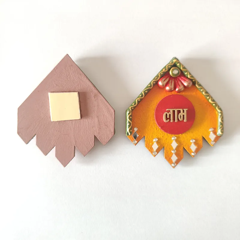 Back and front view of the Laabh wall accent with adhesive pad