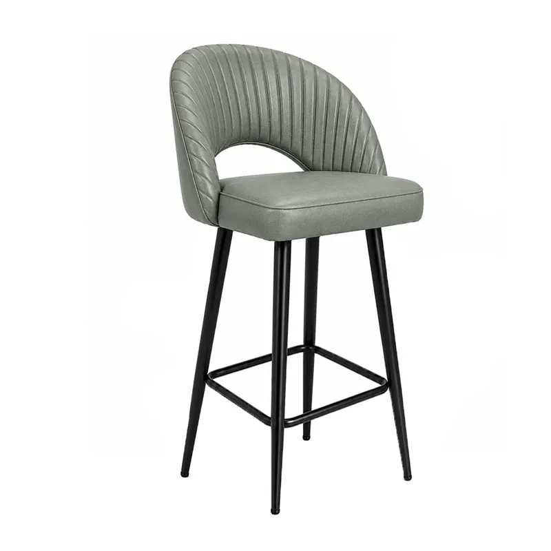 Angled view of a light grey ribbed bar chair with curved back