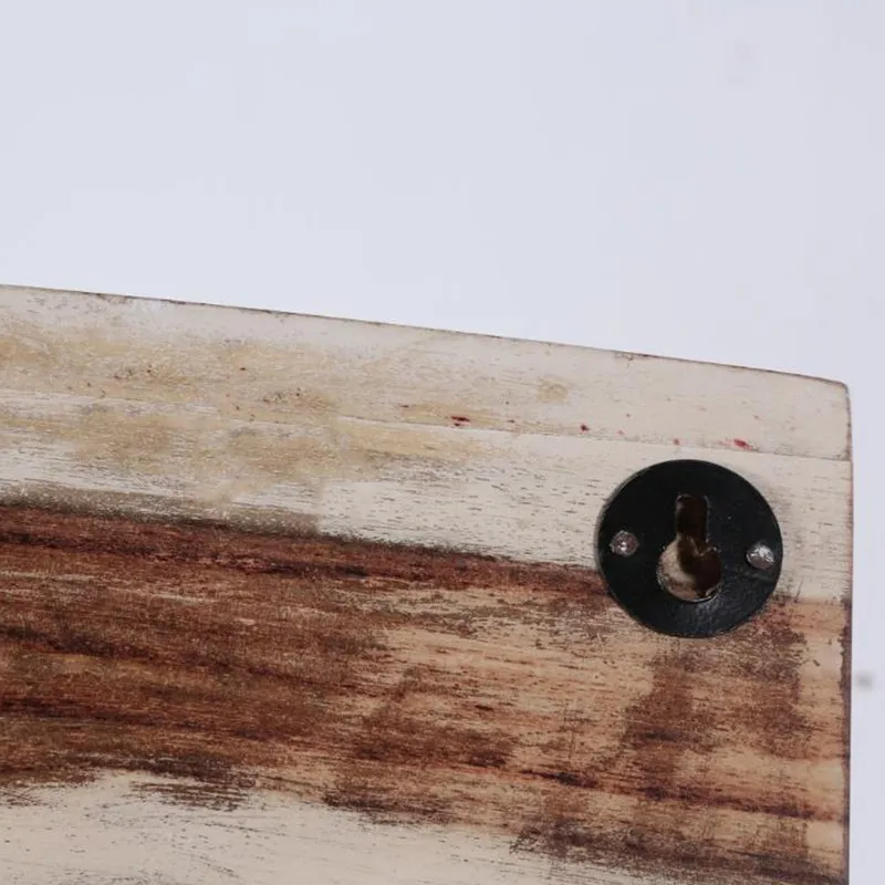 Close-up of the rear wall-mount slot on the wooden key holder
