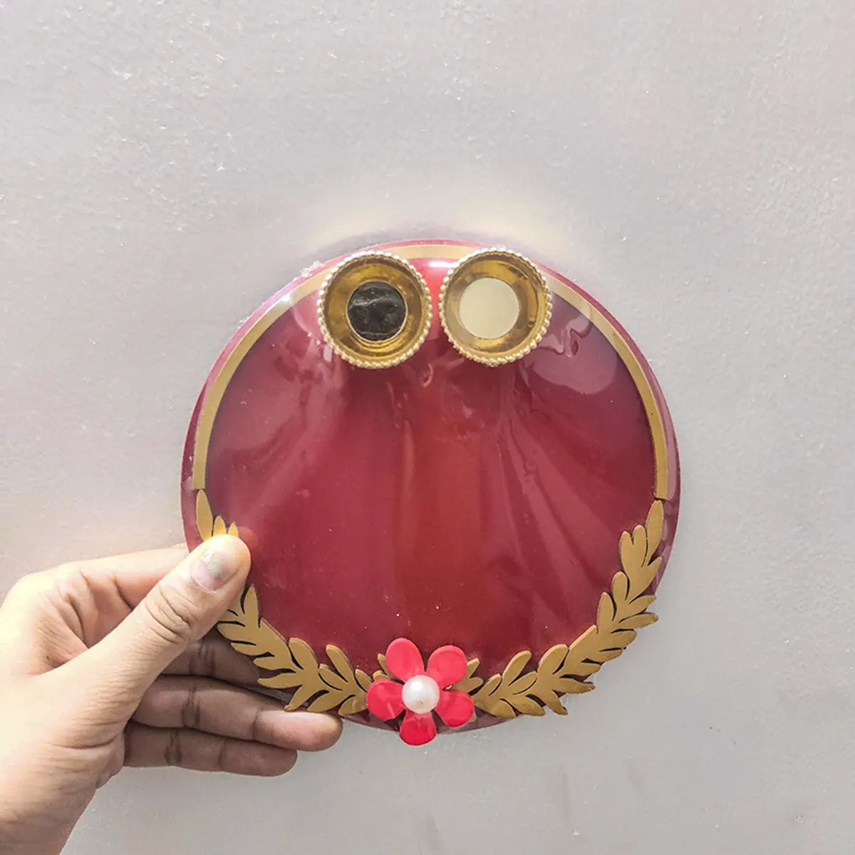 Handheld maroon pooja thali with gold leaf motif and two small bowls